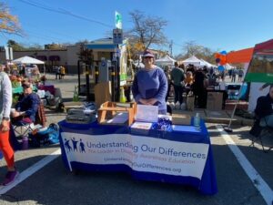 Understanding Our Differences table at community fair