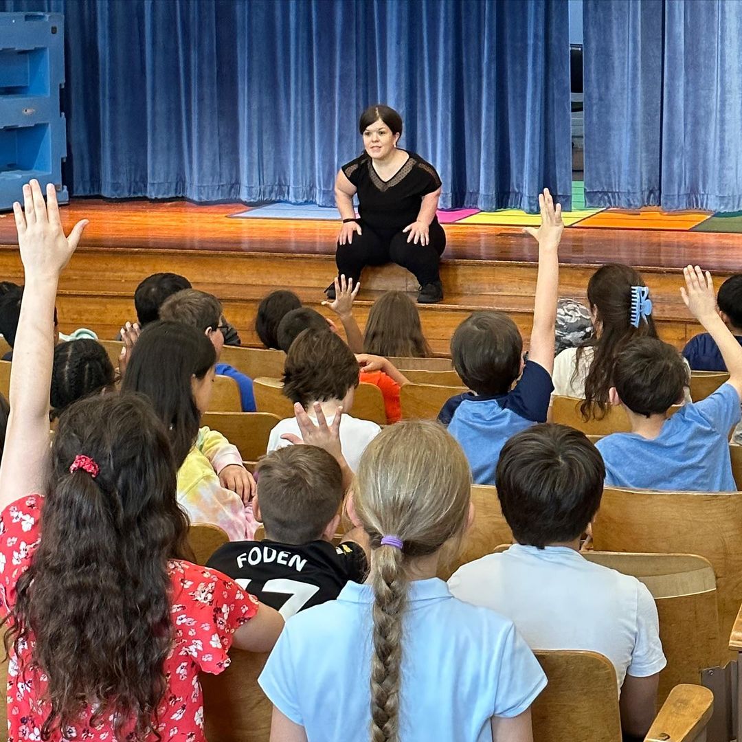 Becky speaking to elementary class